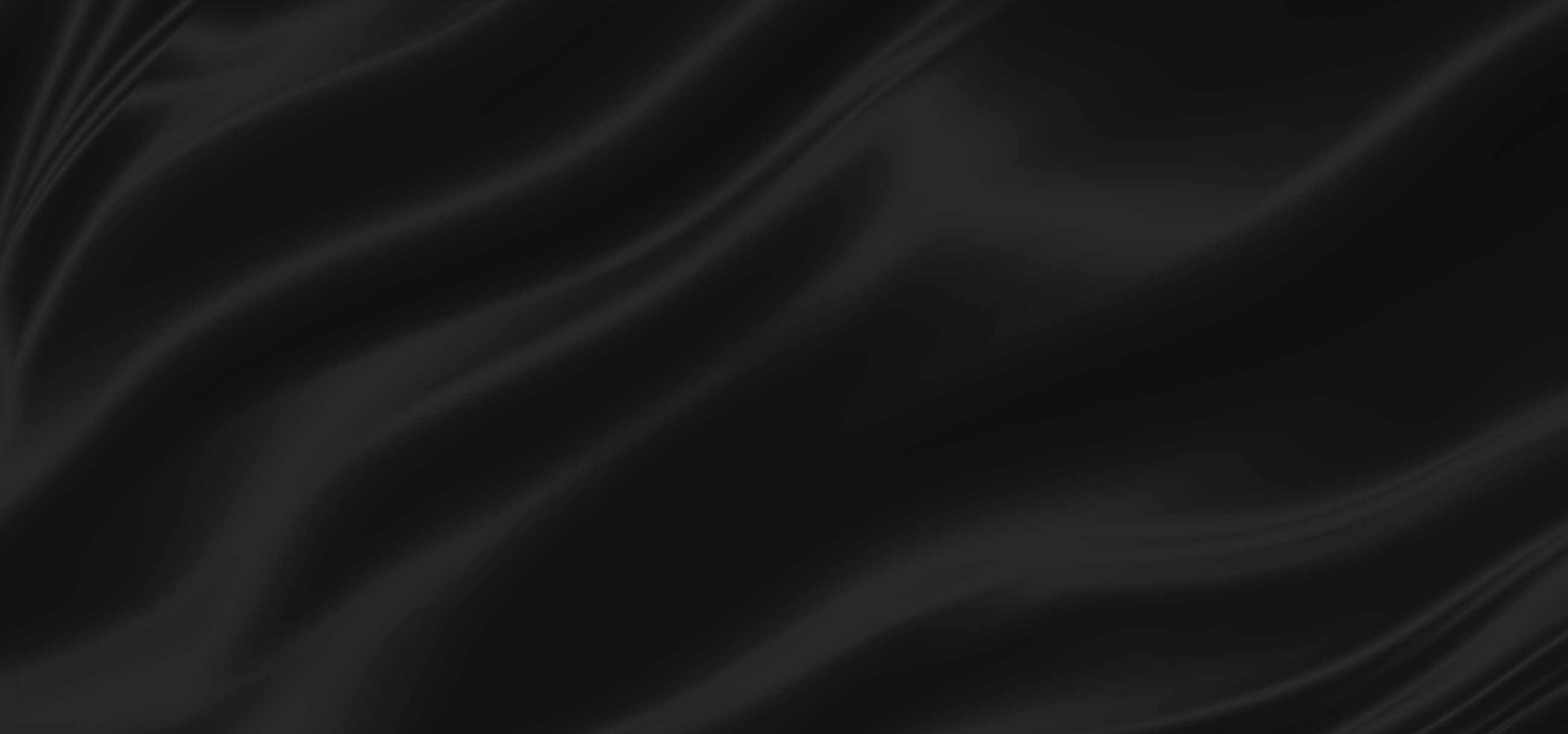 Smooth black fabric with elegant wave patterns.
