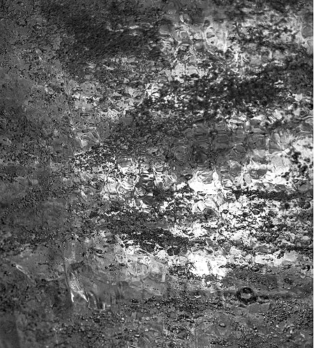 Abstract texture with shimmering water patterns.