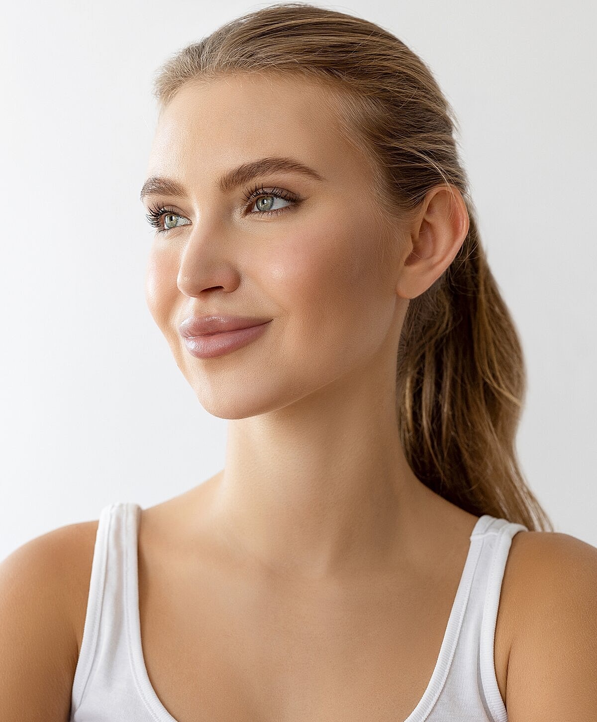 Portrait of a woman with a serene expression.